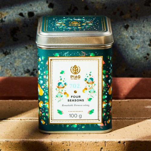 702.Four Seasons Piag Tea- Fascynujący tajwański oolong zachwyca miodową słodyczą owocowych nut 100 g puszka Piag the fresh Tea 
